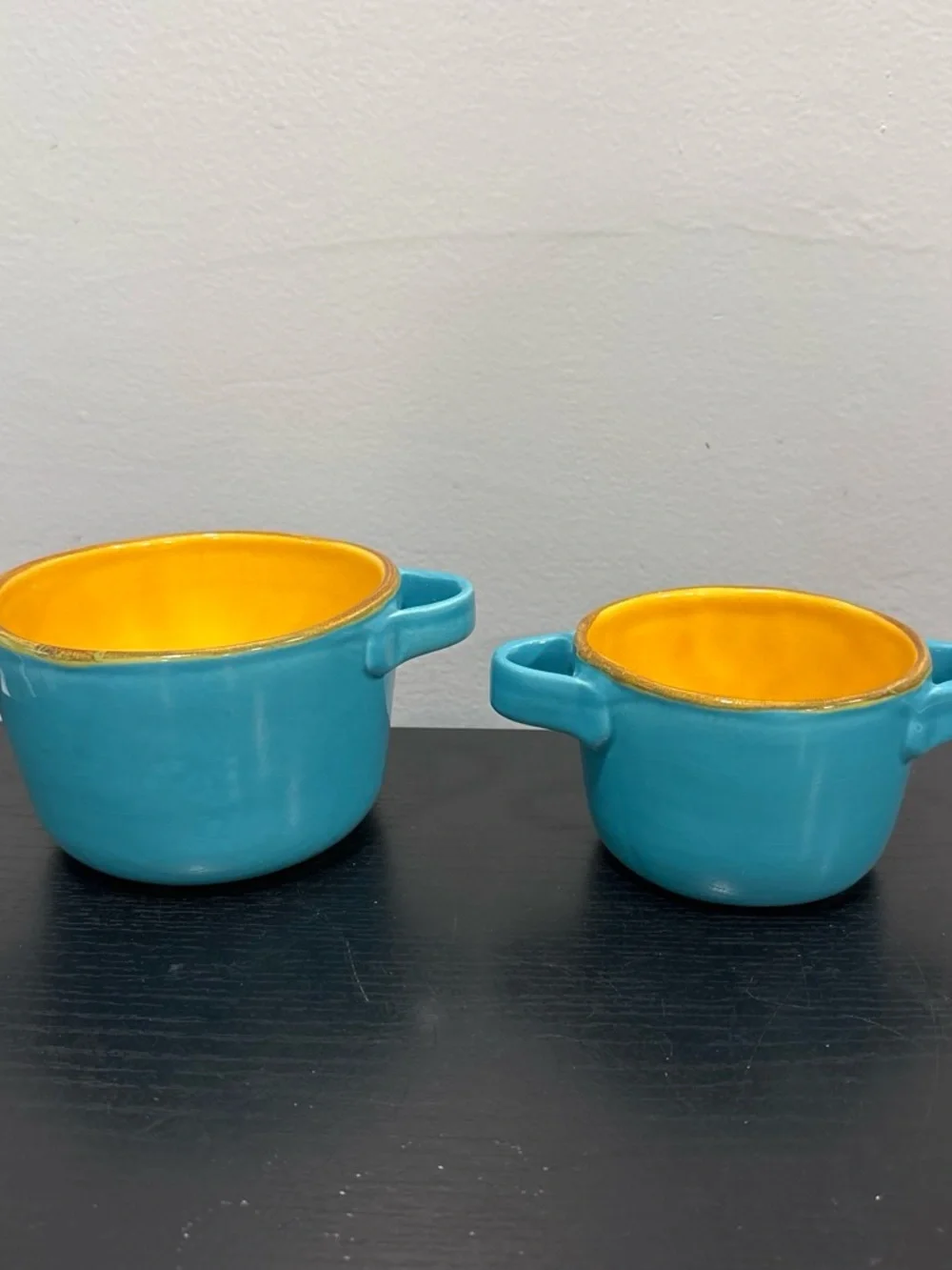 Source Unknown two ceramic